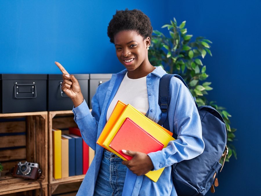 A happy student studying